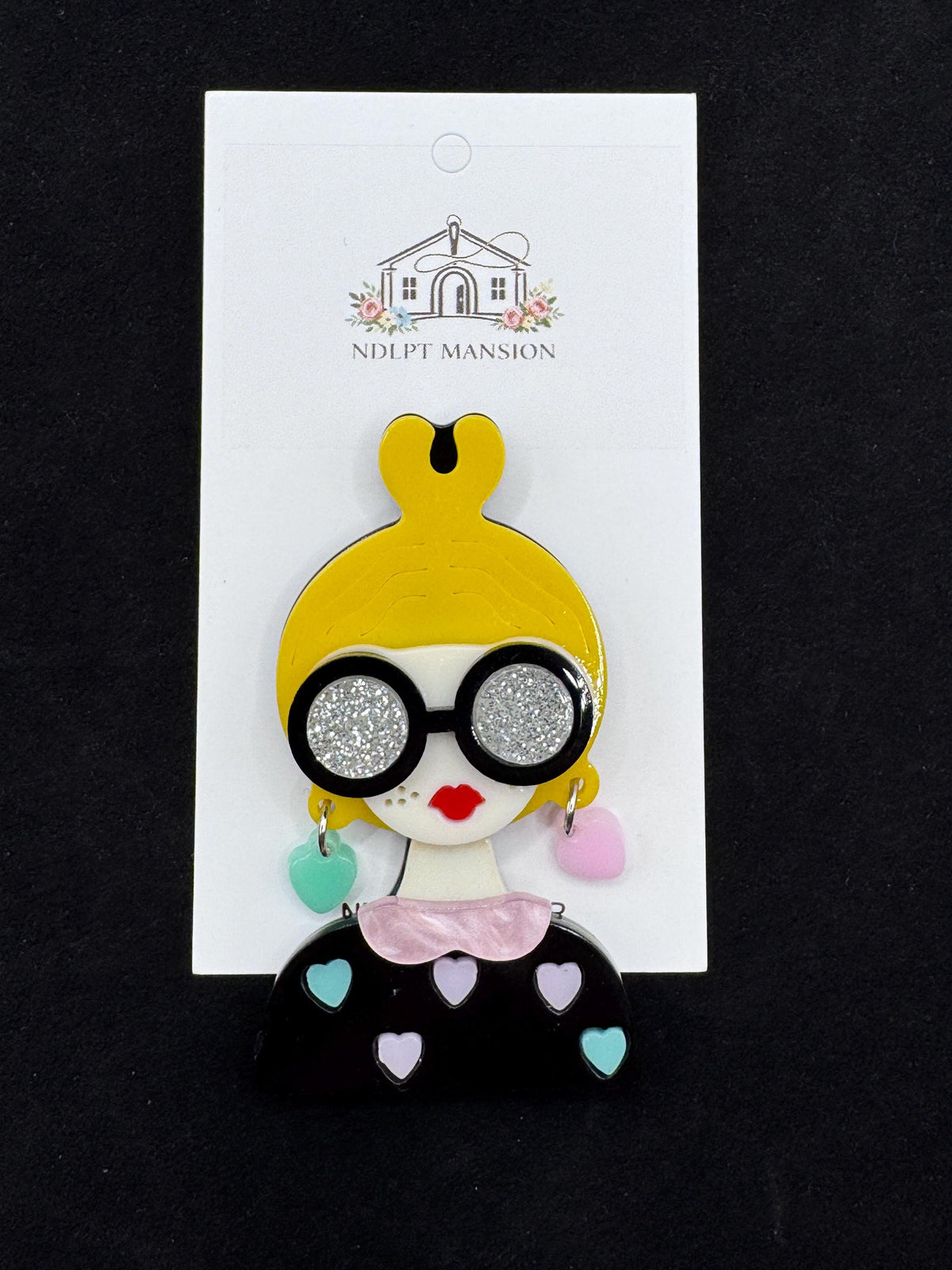 Girl with Yellow Bun Glasses and Heart Shirt Acrylic Needlminder